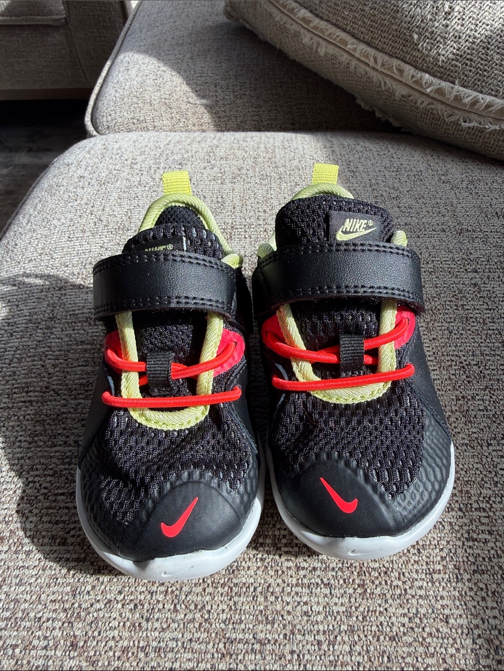 Nike Toddler Black Sneakers with Neon Yellow & Red Accents